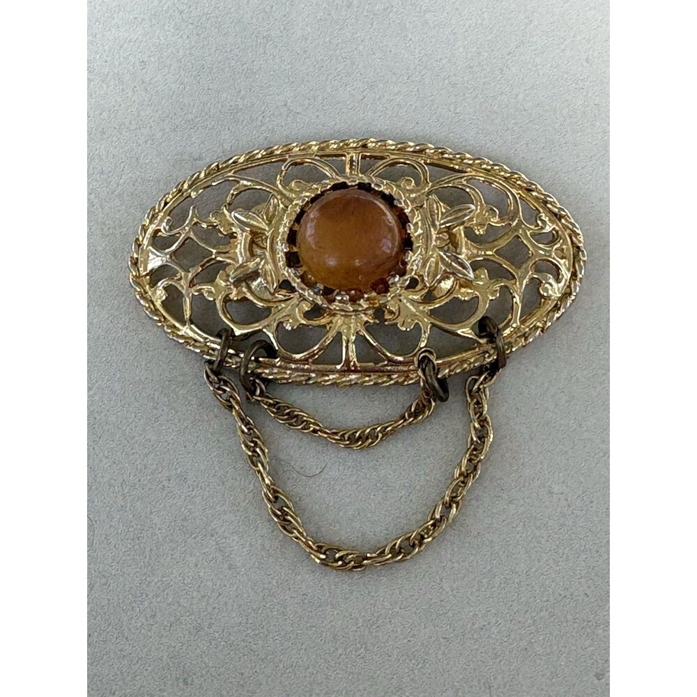 VTG Glass Faux Amber Bright Gold Tone Oval Double Chain Dangle Brooch